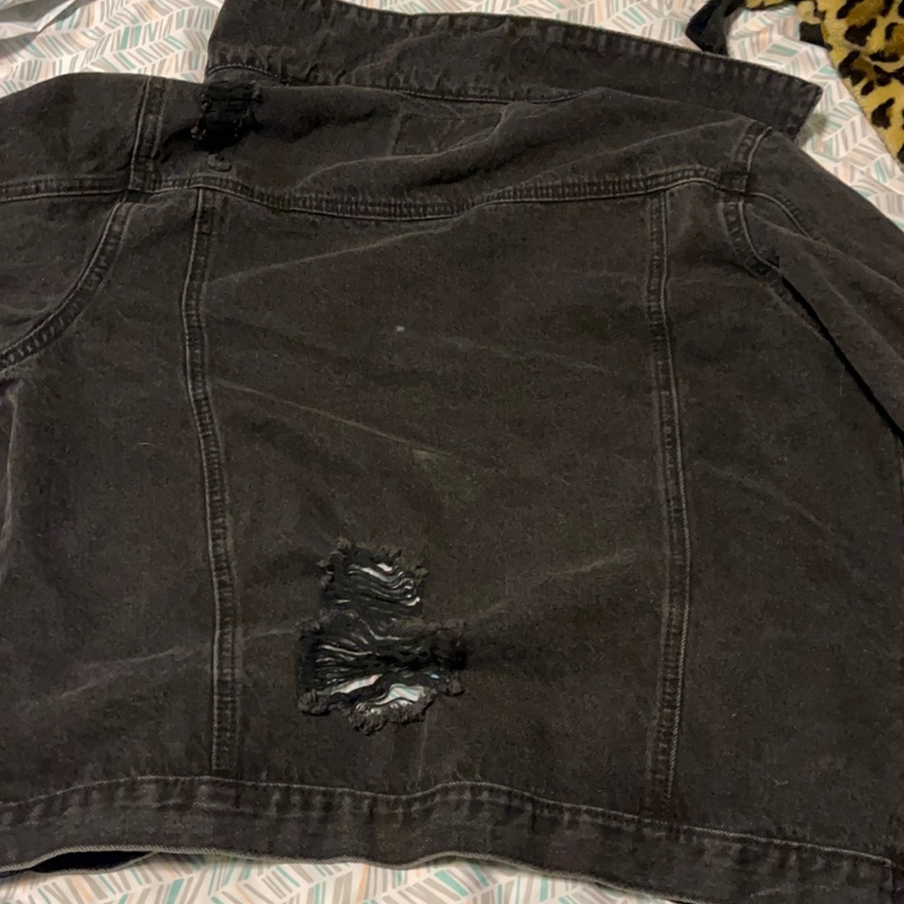 Super cute black distressed jean jacket